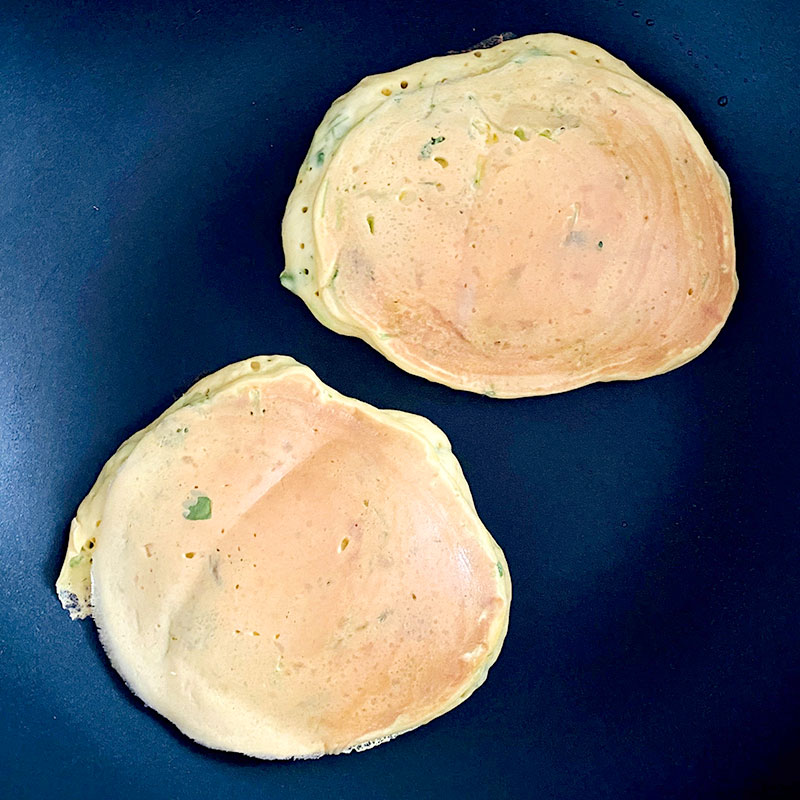 Preheat a frying pan and cook pancakes over a low-medium heat, for about 1 min each side until golden brown. Use about two tablespoons for one pancake. ( makes about 4-5)