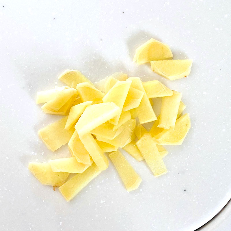 Slice the ginger into bite - size pieces.