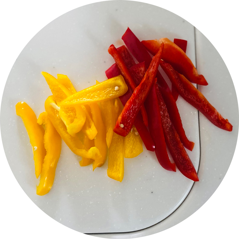 Cut the bell peppers into strips.