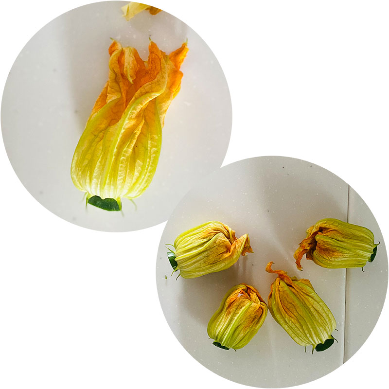 ズッキーニと花に分け、花の芯を取り除く。2.を花の中にやさしく詰める。ズッキーニはスライスする。
